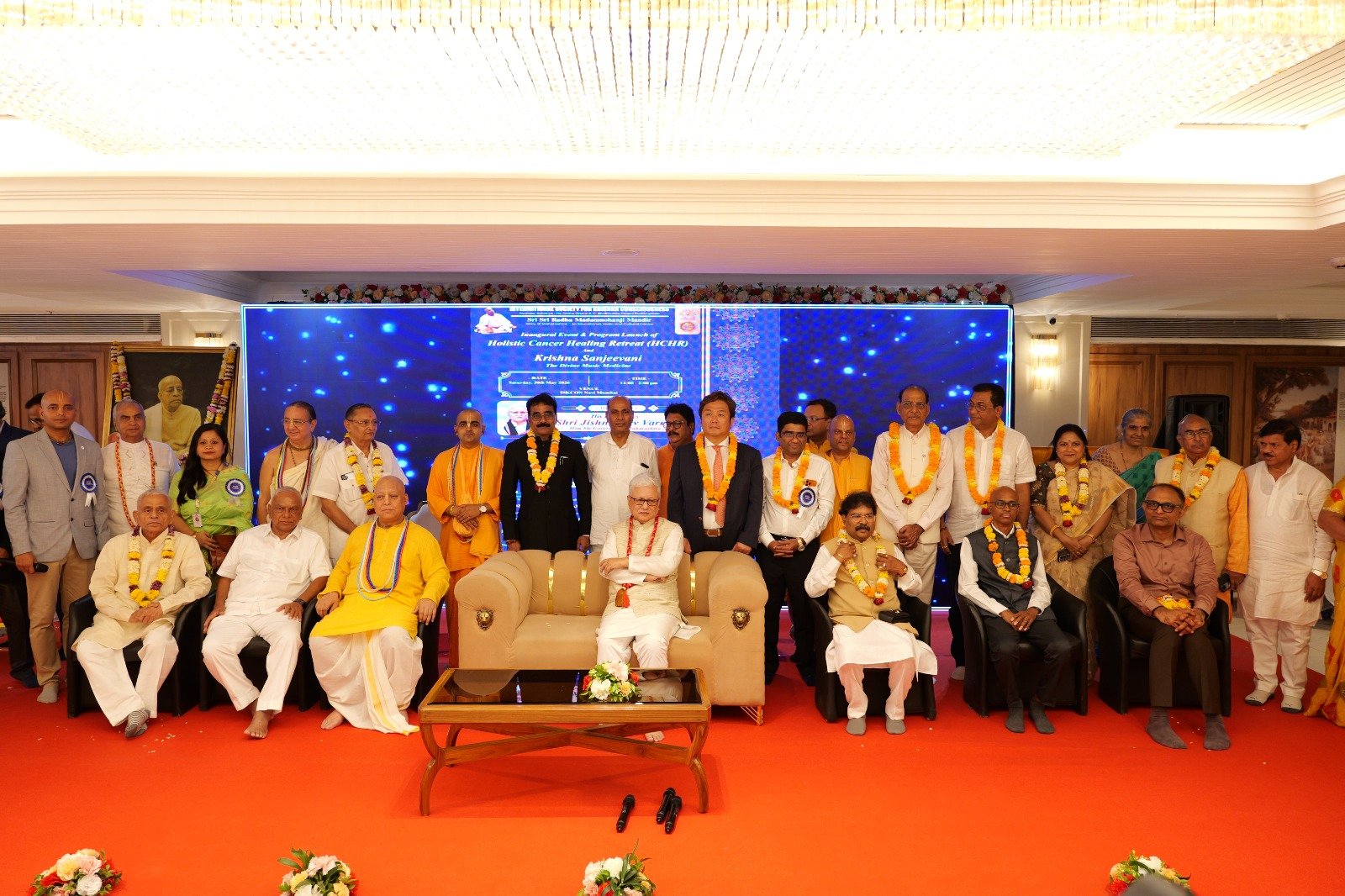 Programme leaders and dignitaries assembled on stage at the Holistic Cancer Healing Retreat inauguration